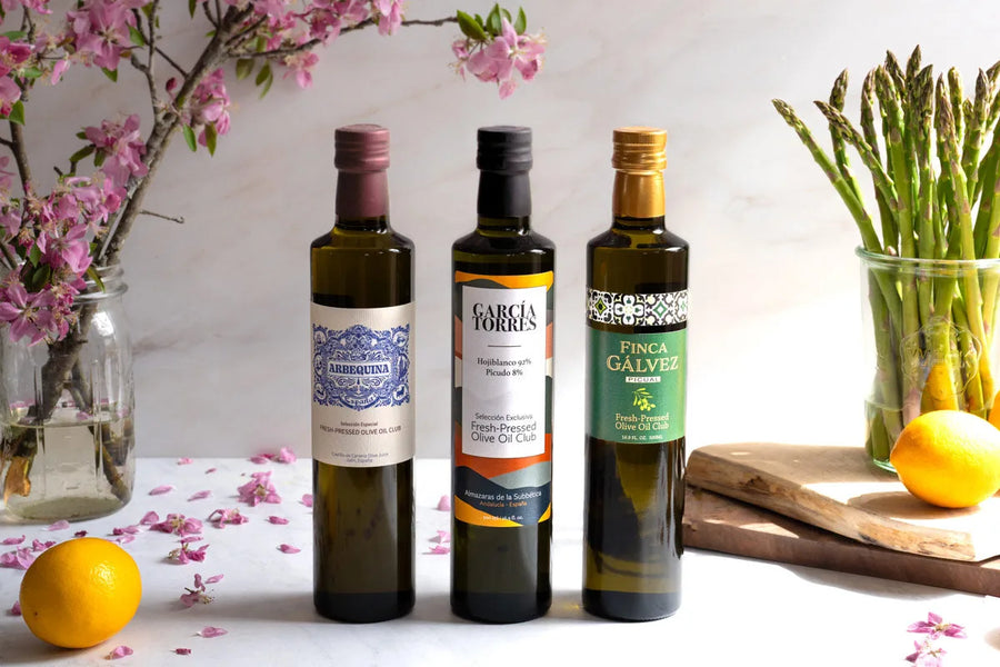Three bottles of Fresh-Pressed Olive Oil Club extra virgin olive oil